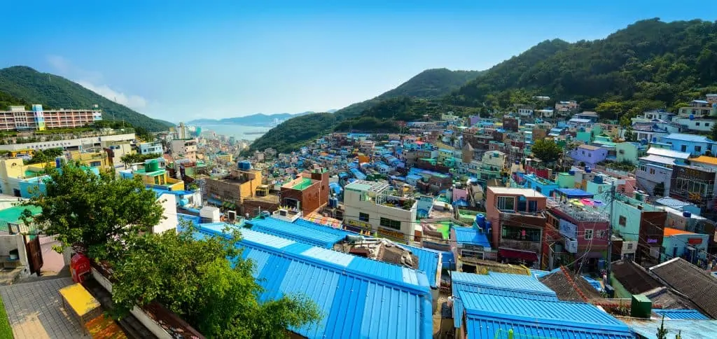 Gamcheon Cultural Village in Busan, Korea, with mountains in the background