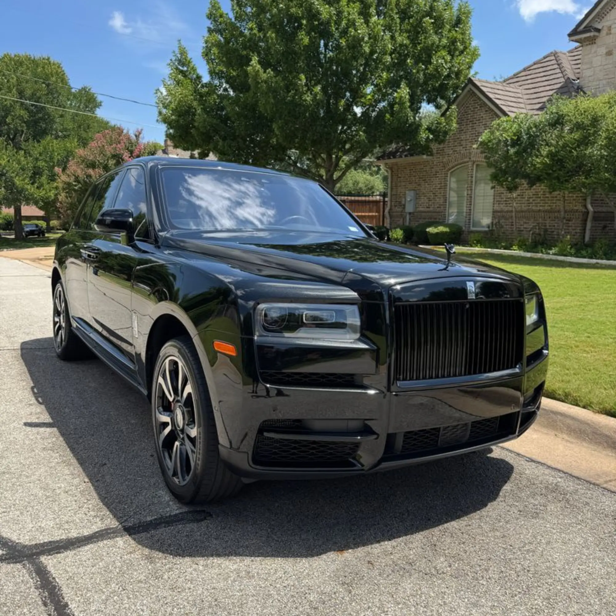 Luxury vehicle protected with paint protection film